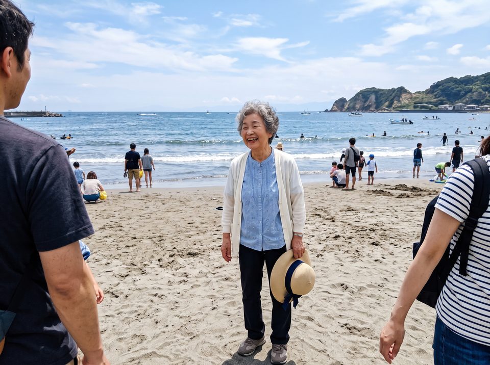 浜辺で家族と出かけたときのスナップ。笑っている女性が小さく写り、横を向いている